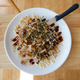 Okonomiyaki, a savory Japanese pancake, is finished with Kewpie mayonnaise. (Photo: Jill Brady/Portland Press Herald via Getty Images)